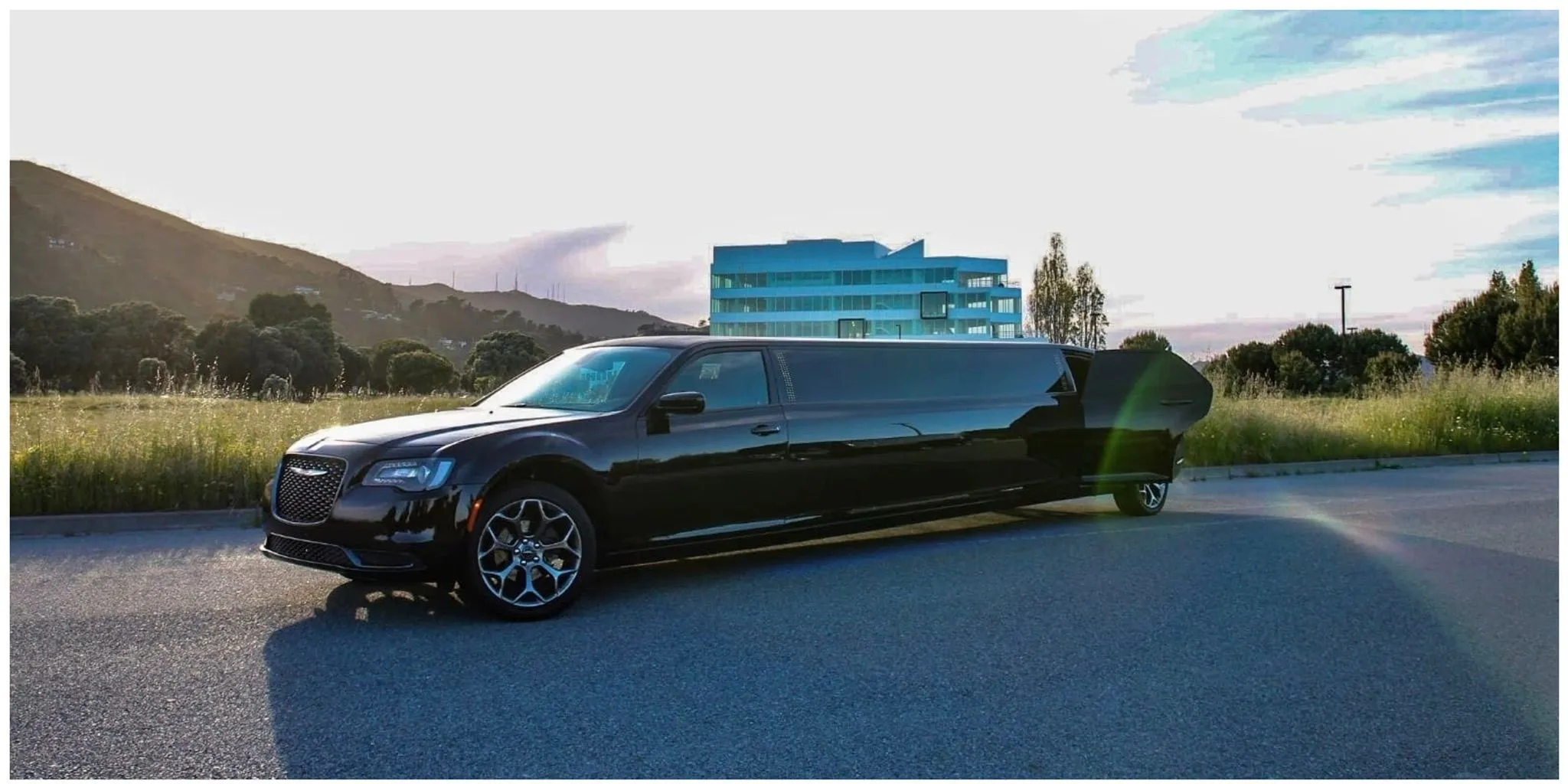 Black stretch limousine, luxury SUV, and passenger van staged for a Bay Area group pickup